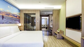 A hotel room with a large bed, a TV, a bathroom, and a mural on the wall. - Atour Hotel Wuhou Temple Chengdu (Chengdu)