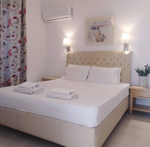 Familjelägenhet - 2 sovrum - icke-rökare | 2 sovrum, värdeförvaringsskåp på rummet och mörkläggningsgardiner