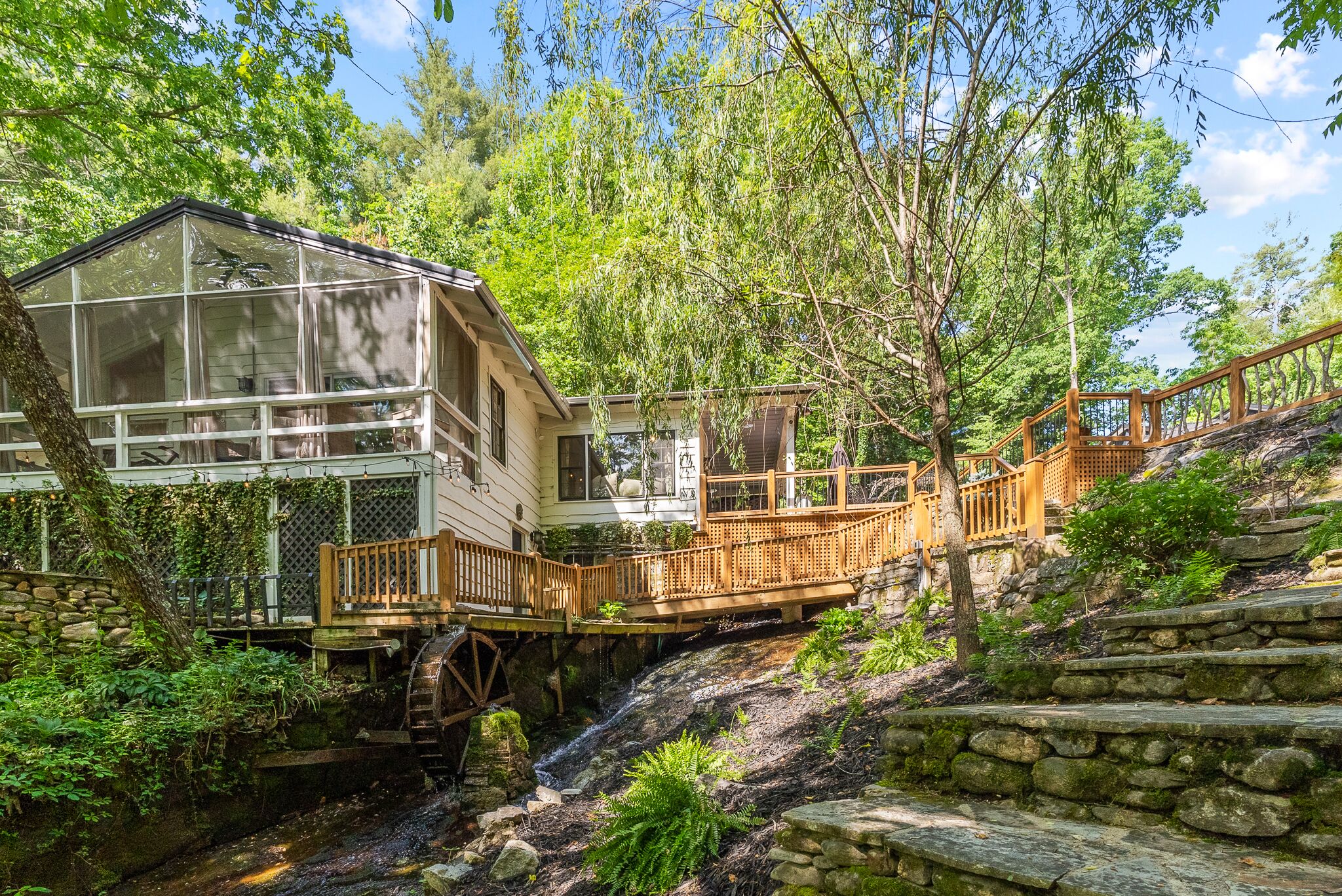 Stunning 7-Acre Peaceful Waterfall Property