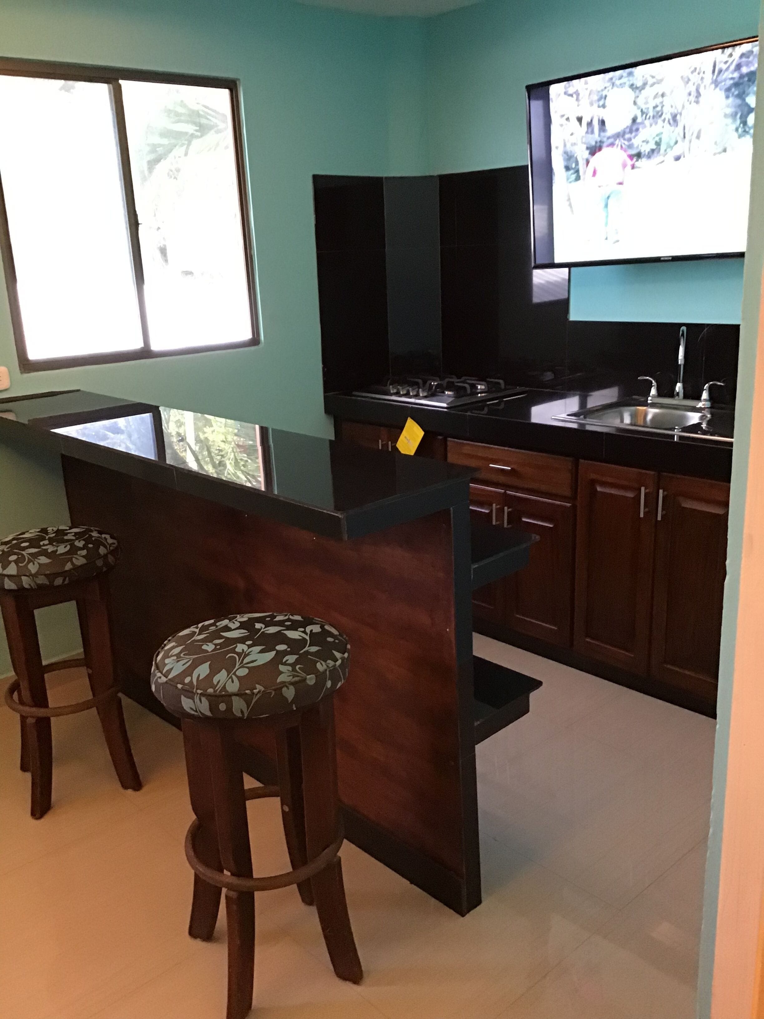 Executive Suite, 1 King Bed | Private kitchen | Fridge, kitchen islands