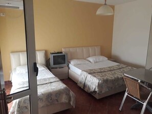 Comfort Apartment, Sea View | 2 bedrooms, in-room safe, desk, free rollaway beds
