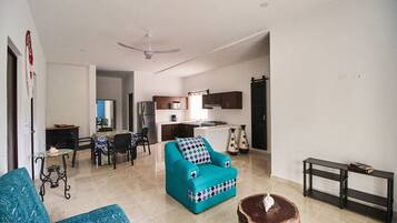 Family Condo, Multiple Beds, Non Smoking, Garden View | Living area | Flat-screen TV, Netflix