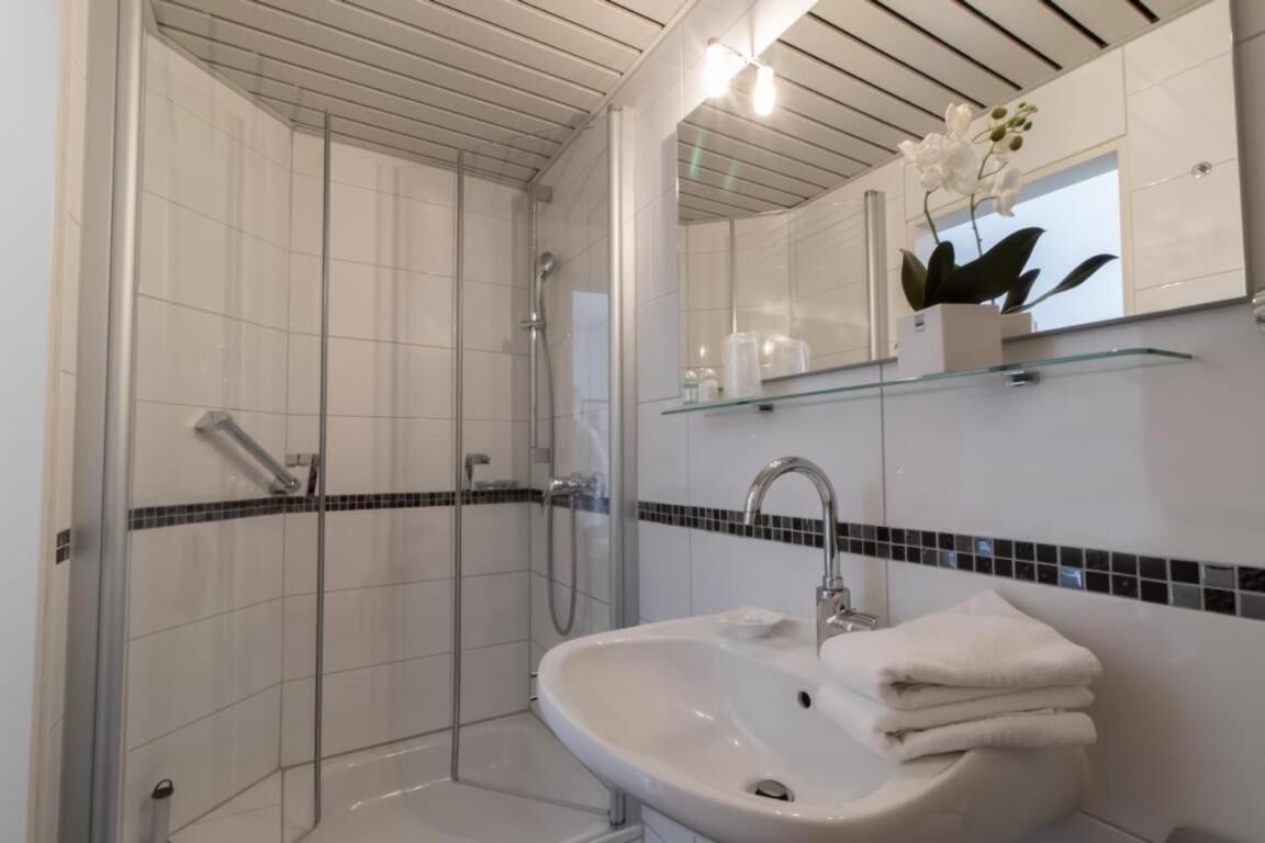 shower, free toiletries, hair dryer, bathrobes