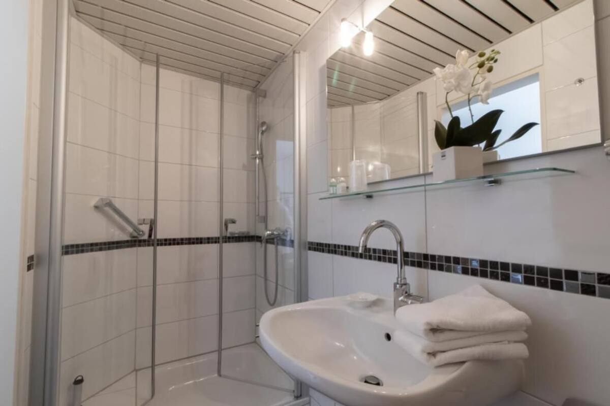 shower, free toiletries, hair dryer, bathrobes