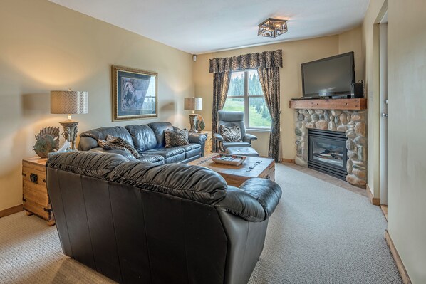 Flat-screen TV, fireplace