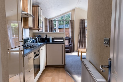 A beautiful Cabin on the 5 star White Cross Bay in a quiet area of the park -