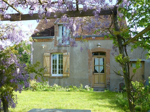 Typical Solognote house renovated in a flowery and wooded setting