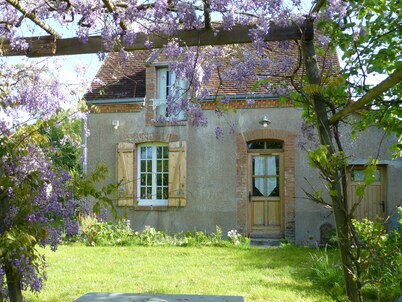 Typical Solognote house renovated in a flowery and wooded setting