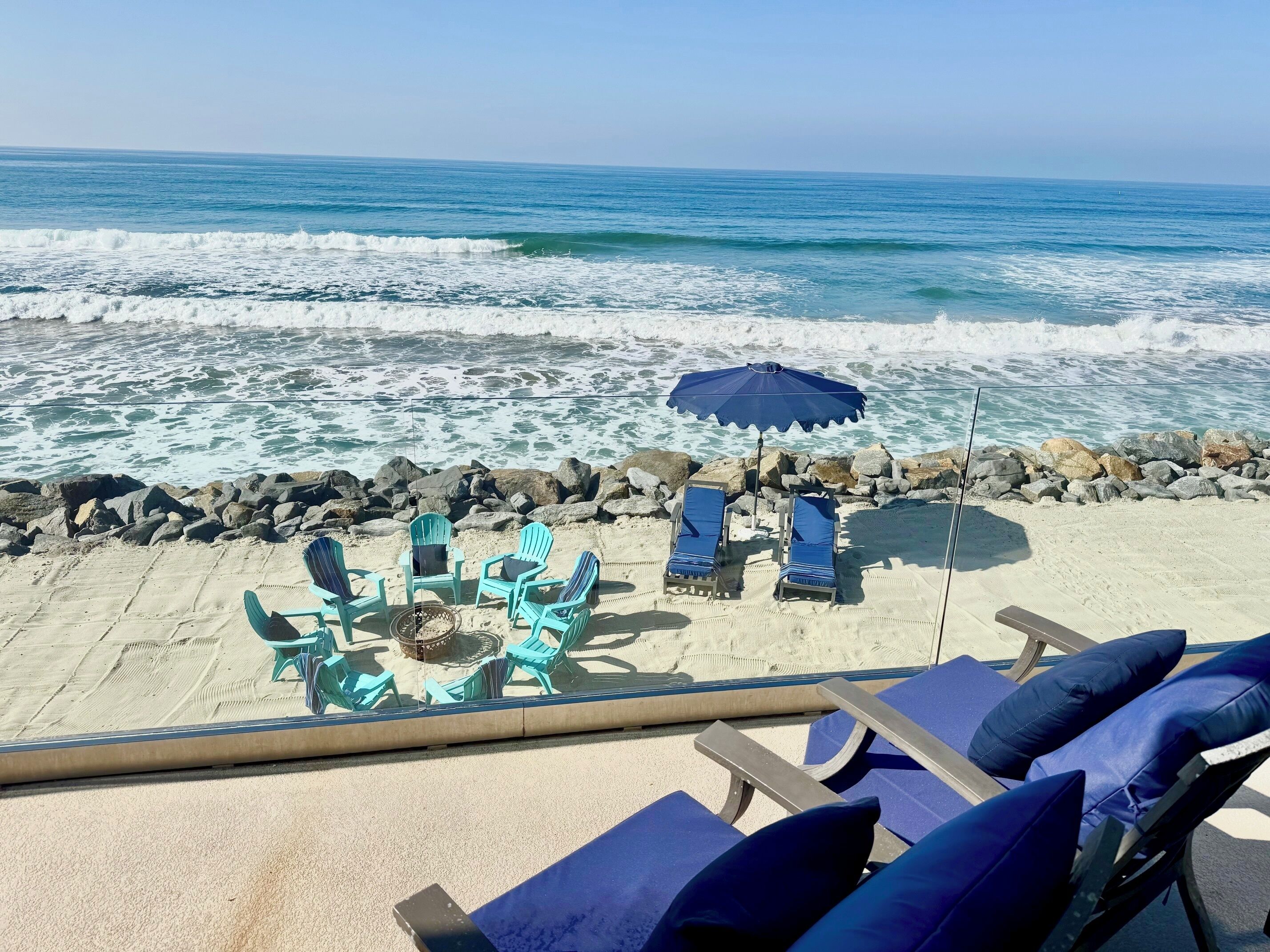 On the beach, sun-loungers, beach towels