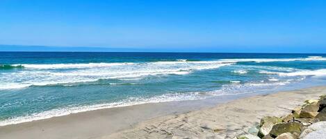 On the beach, sun-loungers, beach towels