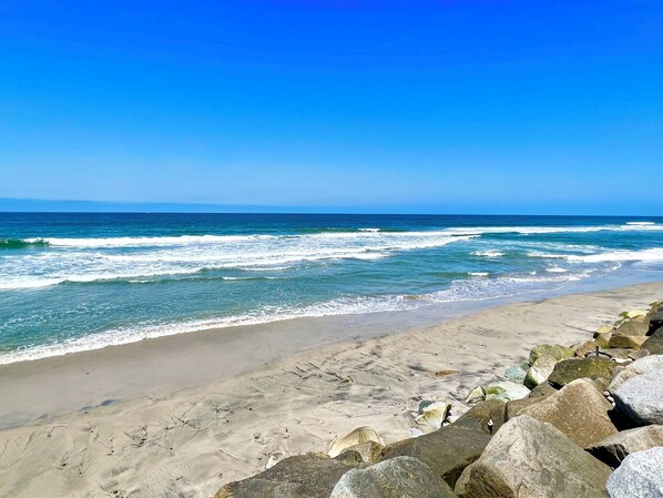 On the beach, sun-loungers, beach towels