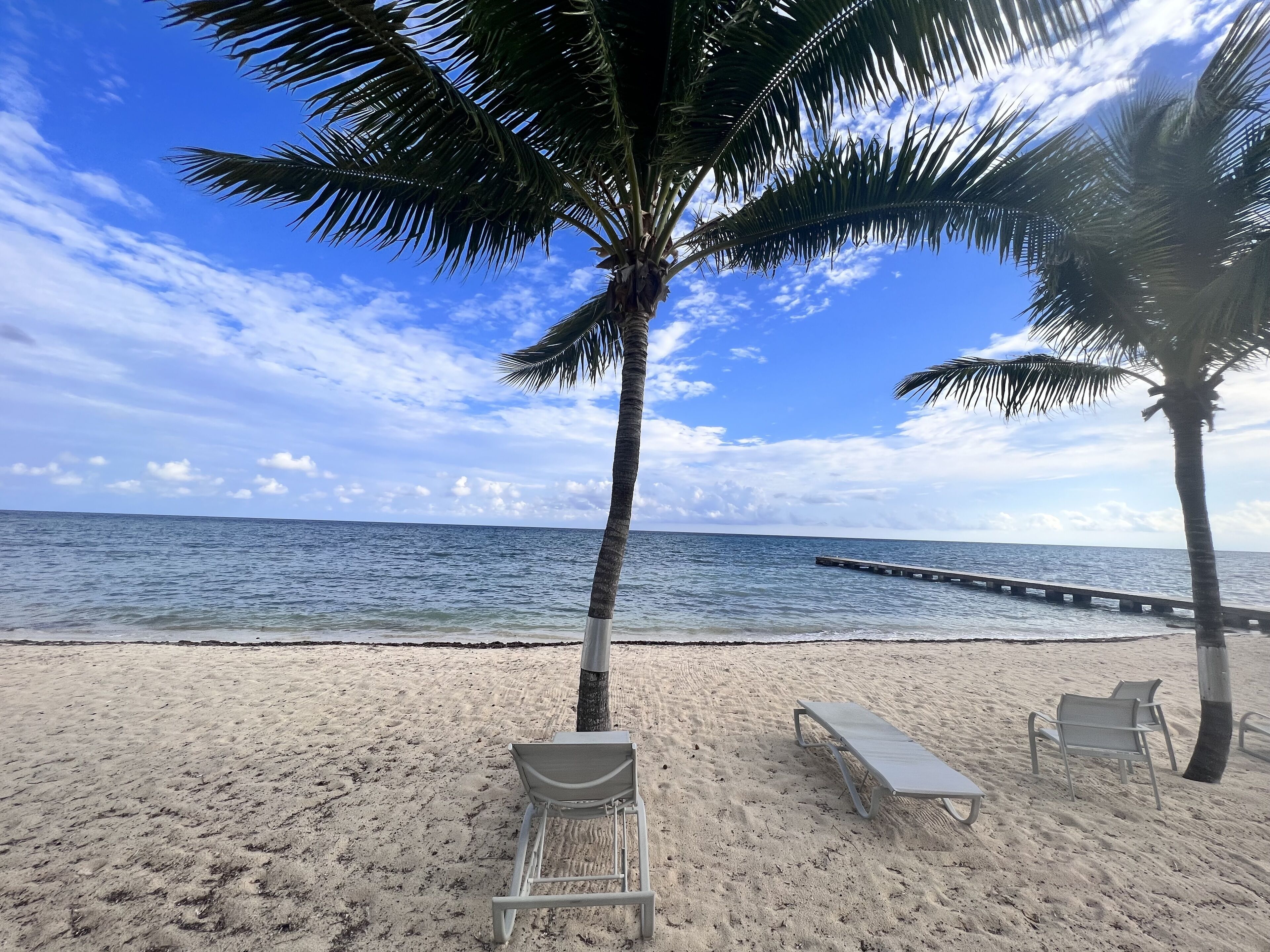 On the beach, sun loungers, beach towels