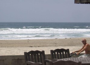 On the beach, sun loungers, beach towels