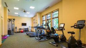 A gym with treadmills, elliptical machines, and a stationary bike. - Modern Studio Condo | Fireplace and Balcony (Crested Butte)