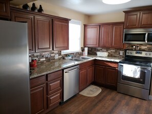 Fridge, microwave, oven, stovetop - Historic Pueblo Bungalow- perfect for families or business travelers (Pueblo)