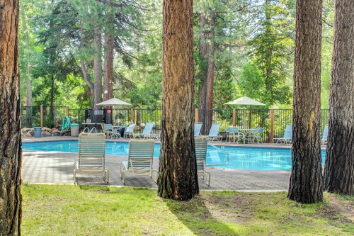 Inviting condo with balconies, fireplace, outdoor pool, sauna, & fitness center