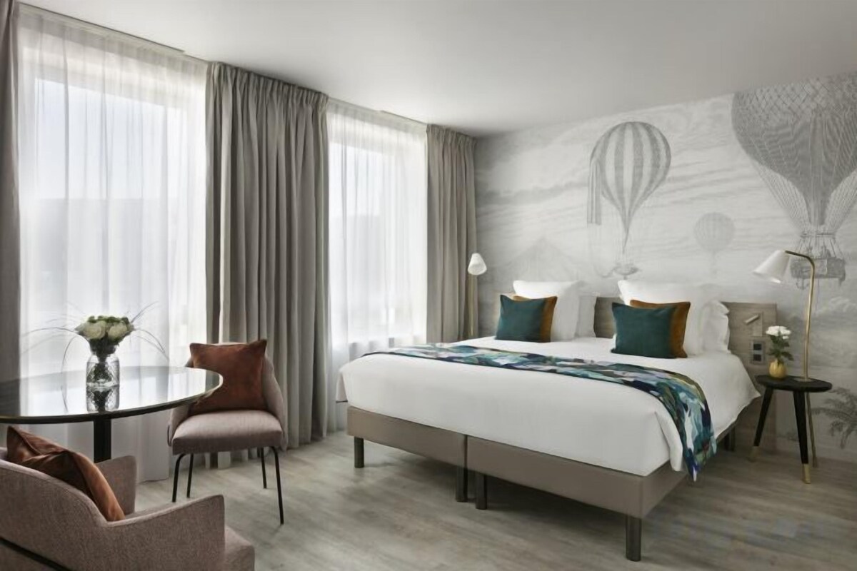 In-room safe, laptop workspace, blackout drapes, soundproofing
