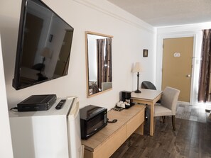 32-inch flat-screen TV with cable channels, TV