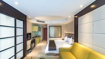 Basic Double Room | Ruang tamu | TV