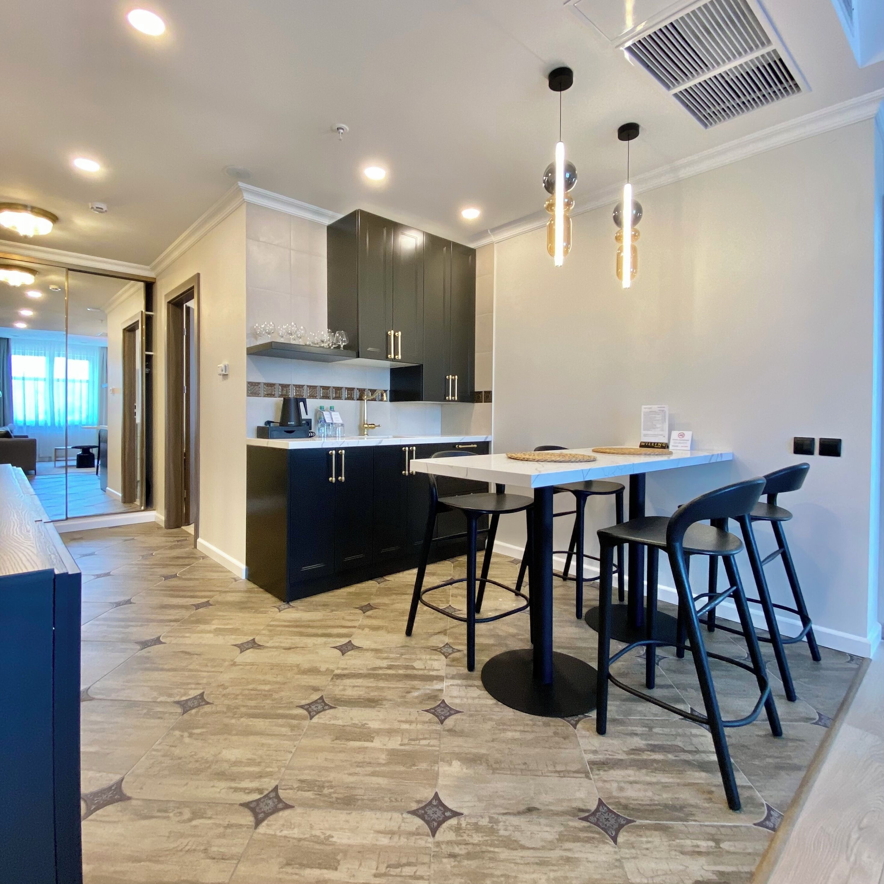 Executive Suite | Private kitchenette | Mini-fridge, electric kettle