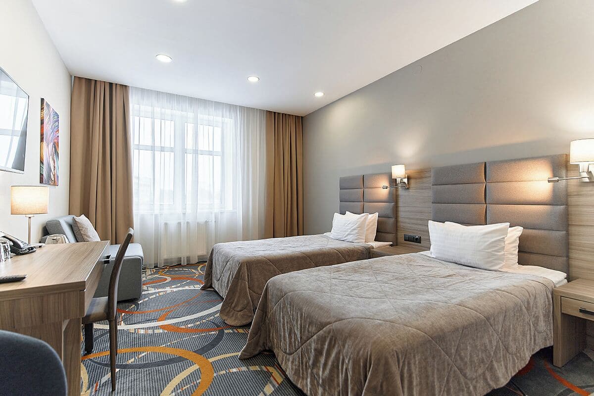 Camera Classic con 2 letti singoli | 1 camera, biancheria da letto di alta qualità, minibar, una scrivania