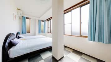 Habitación estándar con 2 camas individuales | Cortinas blackout y ropa de cama