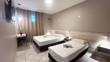 Standard Triple Room | 1 bedroom, minibar, individually decorated, individually furnished