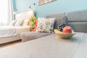 Comfort Apartment, 2 Bedrooms | Living area | 32-inch flat-screen TV with cable channels, TV