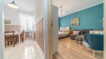 Comfort Apartment, 2 Bedrooms | Living area | 32-inch flat-screen TV with cable channels, TV