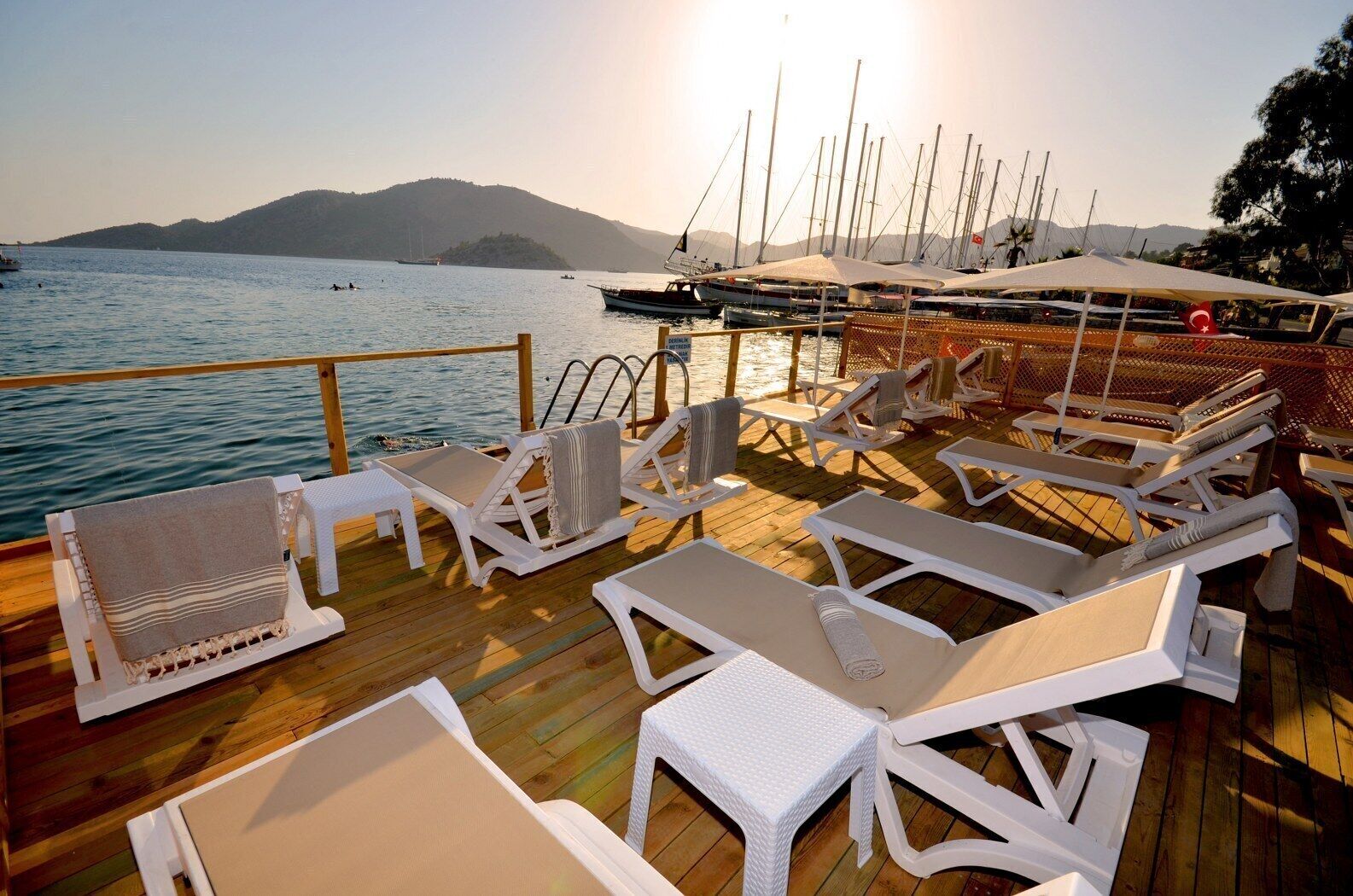 private beach, free beach shuttle, sun-loungers, beach umbrellas