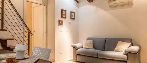 Apartment, 1 Bedroom | Living area | Flat-screen TV