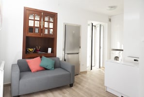 Apartment, Multiple Beds | Living area | Flat-screen TV, fireplace