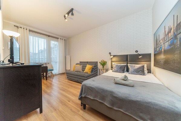 Apartamento | Quartos à prova de som, Wi-Fi de cortesia, roupa de cama