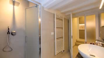 Hair dryer, slippers, towels, soap