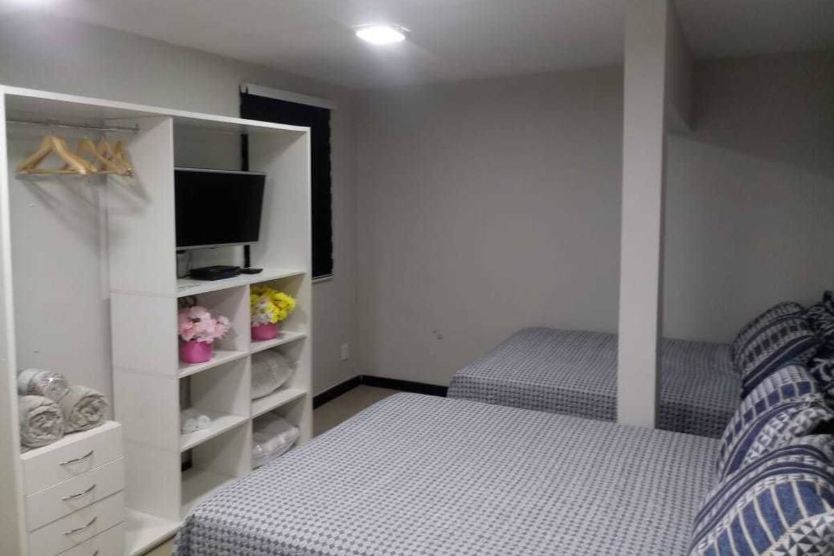 Blackout curtains, iron/ironing board, free WiFi, bed sheets