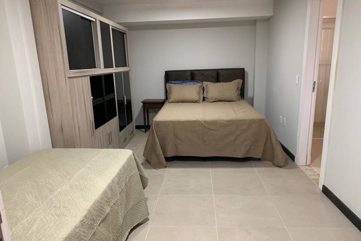 Blackout curtains, iron/ironing board, free WiFi, bed sheets