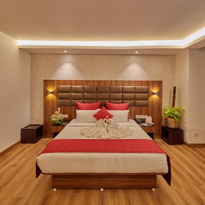 Egyptian cotton sheets, premium bedding, Tempur-Pedic beds, minibar - Shivas Galaxy Hotel (Bengaluru)