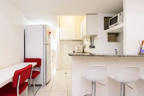 Apartment, Non Smoking | Living area | TV