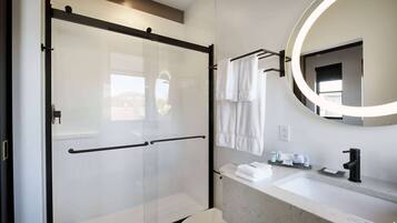 Designer toiletries, hair dryer, towels, soap
