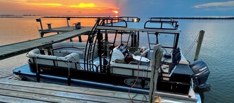 Majestic bayfront home. 450’ pier w/ boat access, crabbing, fishing, & swimming.