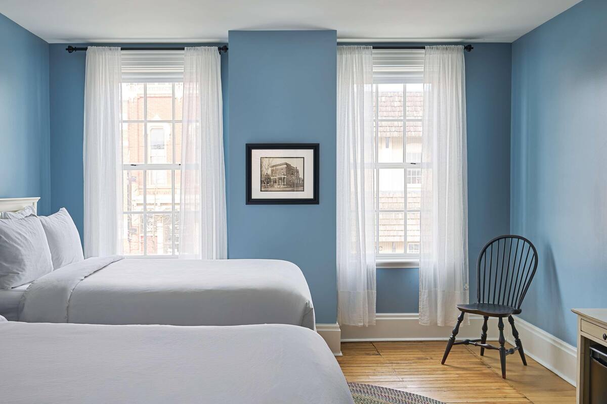 Premium bedding, blackout drapes, iron/ironing board (on request)