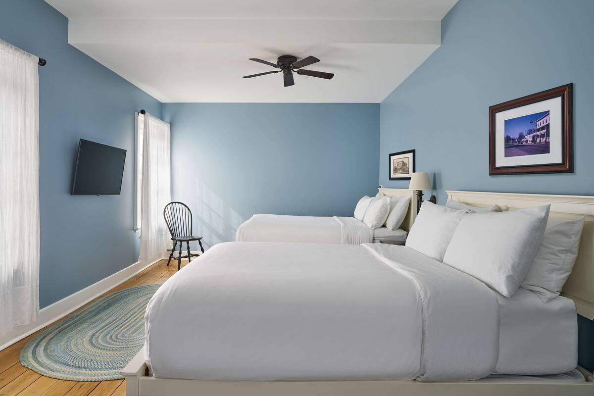 Premium bedding, blackout drapes, iron/ironing board (on request)