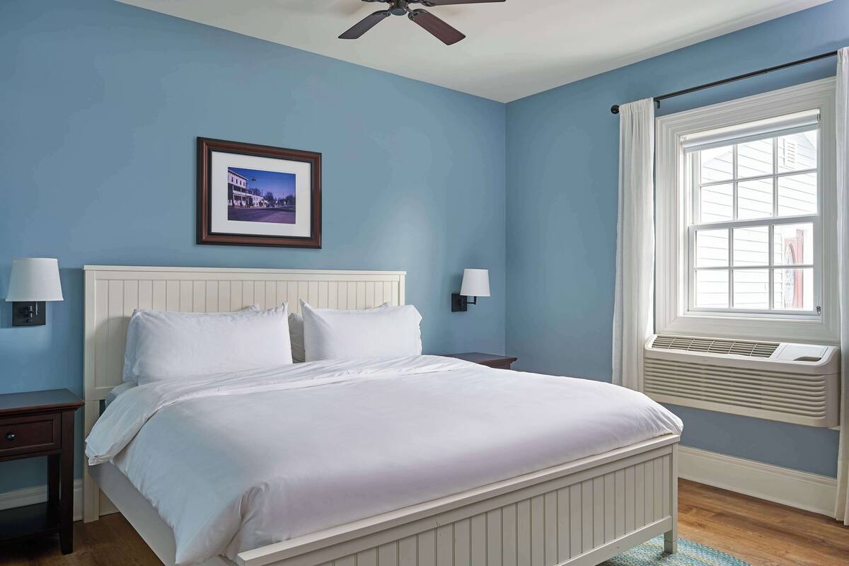 Premium bedding, blackout drapes, iron/ironing board (on request)