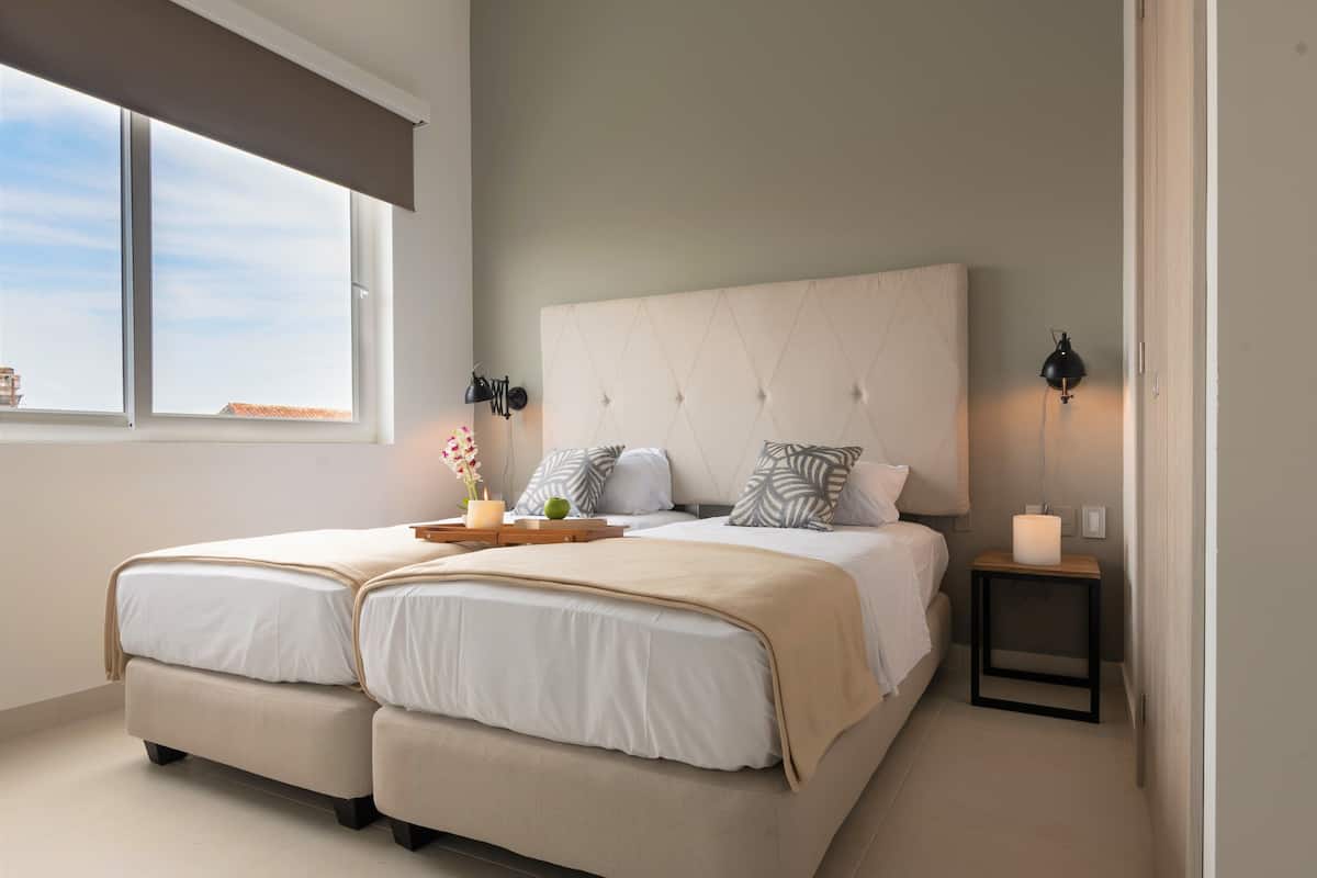 Minibar, blackout curtains, iron/ironing board, free WiFi