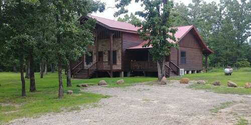 Unique Log House nestled in the woods near Billy Creek.