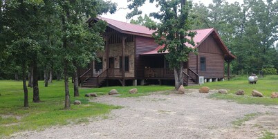 Unique Log House nestled in the woods near Billy Creek.