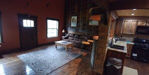 Flat-screen TV, fireplace, DVD player, foosball