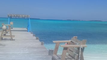 On the beach, sun-loungers, beach towels