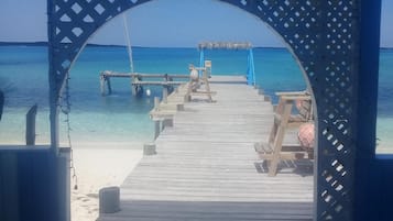 On the beach, sun-loungers, beach towels
