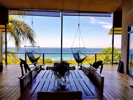 Outdoor dining. SANTA TERESA SURF VISTA VILLAS